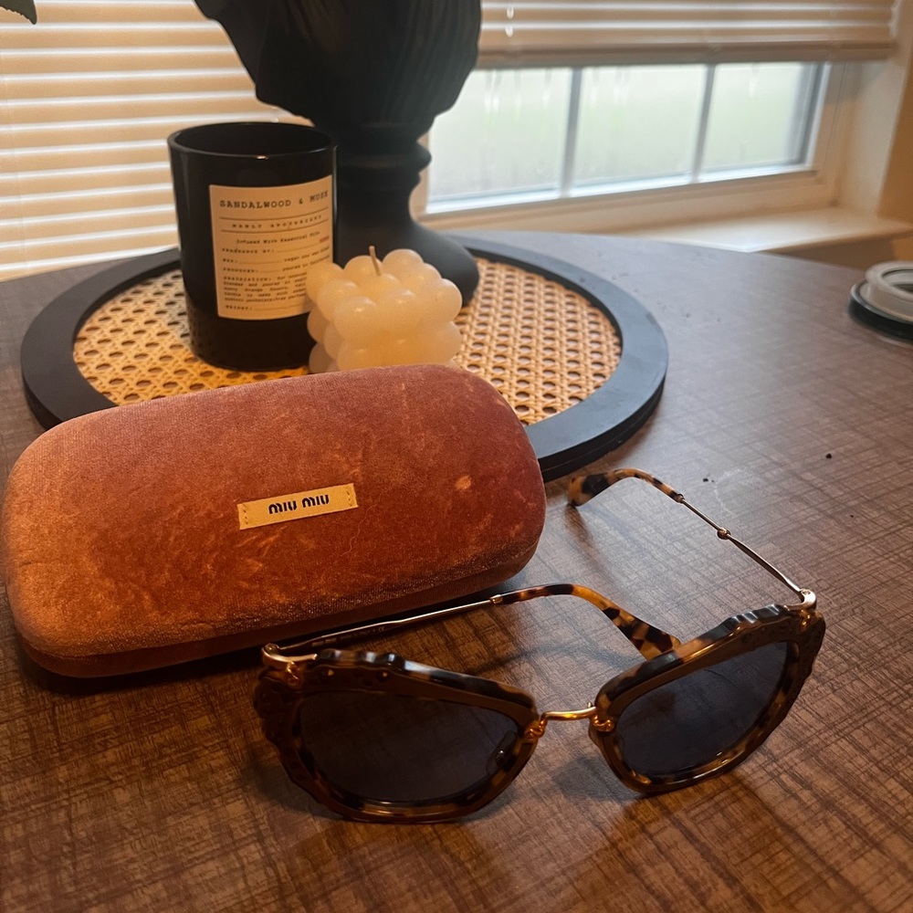 gold frame with blue lense Miu Miu sunglasses